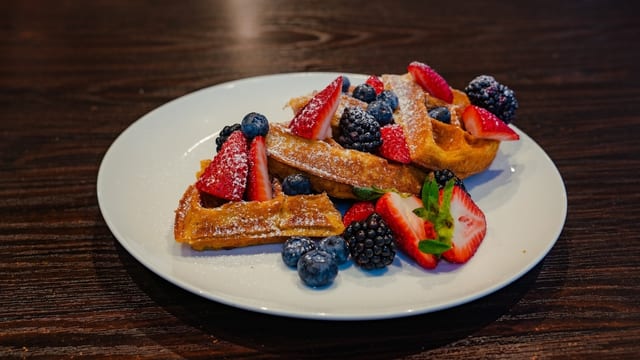 (1) SWEET POTATO WAFFLE W/ FRESH BERRIES.